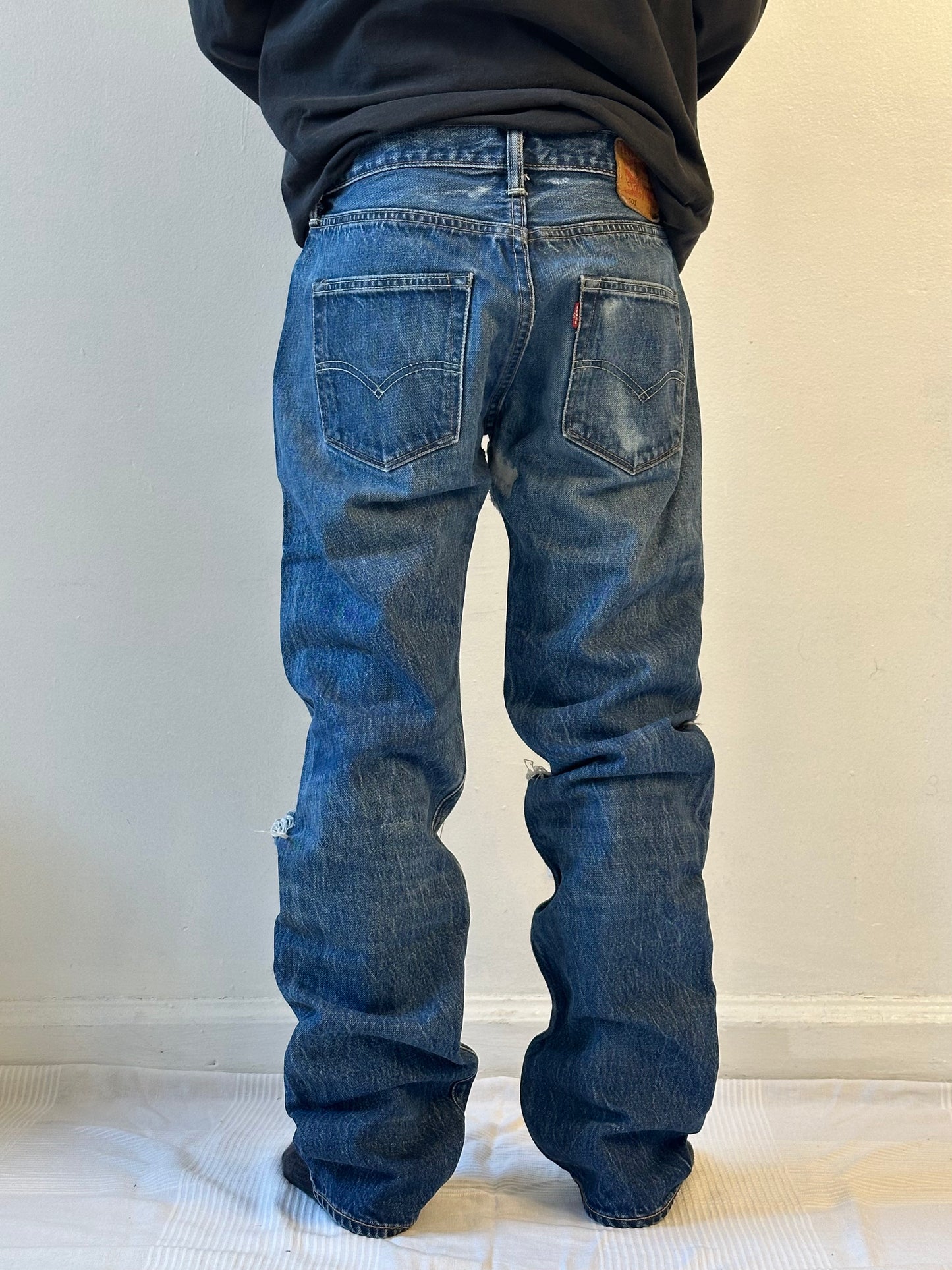 Distressed Levi's 501 White Oak Cone Denim